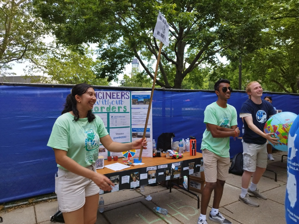 EWB-UIUC members in front of a booth